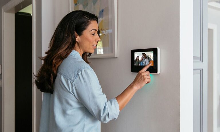 a-girl-is-opening-a-home-door-by-clicking-on-smart-lock-screen