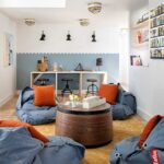 light-blue-beanbag-chairs-are-around-a-central-round-wooden-coffee-table
