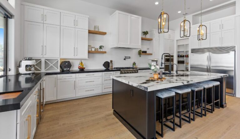 Kitchen Remodel vs. Minor Upgrade? Which Delivers Better Returns? white-color-kitchen-with-white-cabinets-and-white-and-black-table-on-center