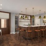 a-prominent-curved-bar-with-aight-colored-countertop-and-a-dark-possibly-wooden-or-wood-paneled-base-is-centered-in-the-room