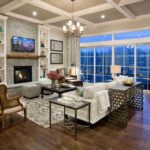 modern-living-room-with-a-white-brick-fireplace-as-the-focal-point-two-elegant-armchair-with-light-colored-and-dark-wood-frame-on-a-wall-and-a-white-color-sofa-and-a-coffee-table