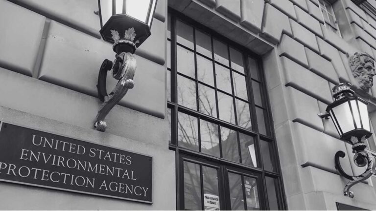 Is R-410A Banned in 2026? What the EPA Rule Actually Says? close-up-view-of-the-buildings-facade-featuring-a-large-window-with-multiple-panes-and-two-wall-mounted-lamps