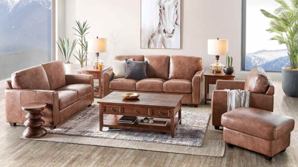 An Image of Living room Painted with off White and Brown Sofa