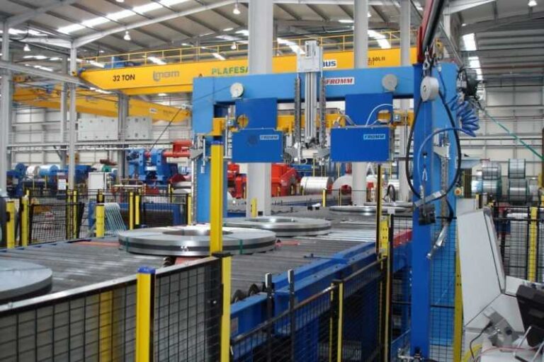 this-industrial-setup-is-specifically-designed-to-securely-bundle-and-stabilize-heavy-steel-coils