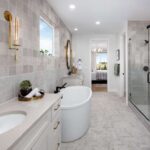 a-spacious-modern-bathroom-with-large-frameless-glass-enclosed-shower-serves-as-a-focal-point