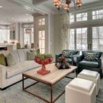 a-spacious-modern-open-concept-living-area-with-high-ceilings-and-large-windows-that-fill-the-space-with-natural-light