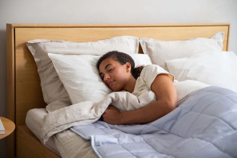 a-young-person-sleeping-peacefully-in-a-comfortable-bed-and-her-eyes-are-closed-appearig-deeply-asleep