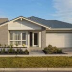 a-modern-single-story-suburban-house-the-house-has-a-light-colored-exterior-with-brick-and-panel-finishes-and-a-dark-grey-roof