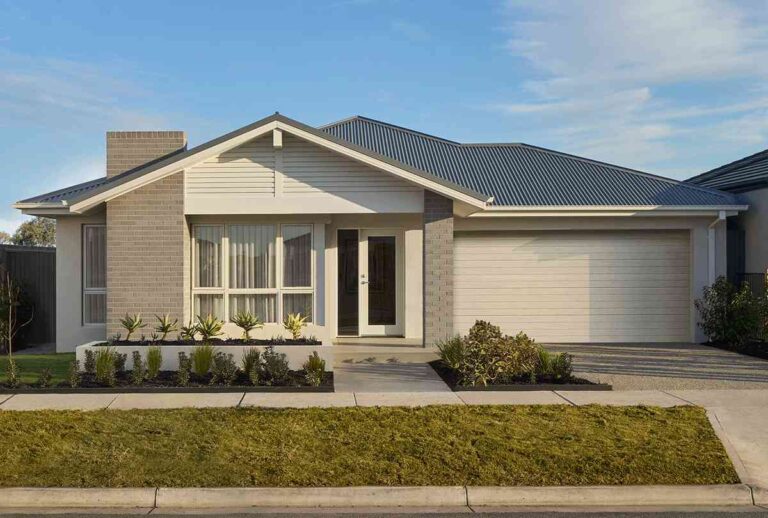 a-modern-single-story-suburban-house-the-house-has-a-light-colored-exterior-with-brick-and-panel-finishes-and-a-dark-grey-roof