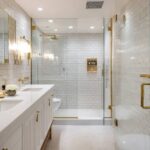 a-modern-minimalist-bathroom-design-features-a-large-frameless-transparent-glass-door-and-partition-and-entire-shower-interior-and-adjacent-walls