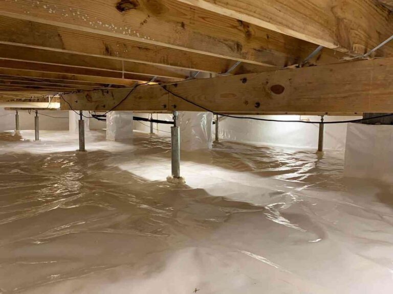 Common Mistakes to Avoid When Repairing a Crawl Space the-area-beneath-a-house-cleanly-lined-with-a-thick-white-plaster-vapor-barries-covering-the-ground-and-pillars